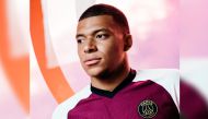 Paris Saint-Germain's French star  Kylian Mbappé sporting the new Kit  which is now available in PSG Store at Doha's Villaggio mall.