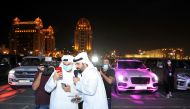 Qatari social media influencers Abdullah Al Ghafri and Hussain Al Sada conducted a mini quiz competition based on iPhone models during the livestream of Apple keynote speech organised by Starlink at Katara in Doha on Tuesday evening. Pic: Salim Matramkot/