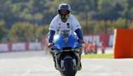 Team Suzuki Ecstar's Joan Mir celebrates after winning the world championship REUTERS/Albert Gea