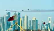 Aircraft taking part in a air show rehearsal to celebrate Qatar National Day over the Corniche skyline yesterday. Pic: Salim Matramkot/The Peninsula