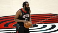 PORTLAND, OREGON - DECEMBER 26: James Harden #13 of the Houston Rockets dribbles during the second quarter against the Portland Trail Blazers at Moda Center on December 26, 2020 in Portland, Oregon. Steph Chambers/Getty Images/AFP