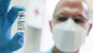 A medical worker holds a vial of the Russian Sputnik V coronavirus vaccine in Belgrade, Serbia, January 6, 2021. REUTERS/Fedja Grulovic//File Photo