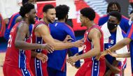 Philadelphia 76ers forward Tobias Harris (12) celebrates with guard Ben Simmons (25) and center Joel Embiid (21) after scoring the game winning basket during the fourth quarter against the Los Angeles Lakers at Wells Fargo Center. Bill Streicher