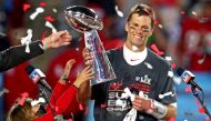 Tampa Bay Buccaneers quarterback Tom Brady (12) celebrates with the Vince Lombardi Trophy after beating the Kansas City Chiefs in Super Bowl LV at Raymond James Stadium. Mandatory Credit: Mark J. Rebilas-USA TODAY Sports