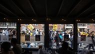 People participate during a national day of action to combat anti-Asian violence in Queens, New York, U.S., March 27, 2021. REUTERS/Jeenah Moon
