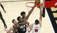 Atlanta Hawks center Clint Capela (15) defends the shot of Chicago Bulls guard Zach LaVine (8) in the fourth quarter at State Farm Arena.