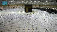 Muslims, maintaining social distancing, perform late night prayers on the night of 27th Ramadan in the Grand Mosque during the holy month of Ramadan, in the holy city of Mecca, Saudi Arabia, May 9, 2021. Saudi Press Agency/Handout via REUTERS