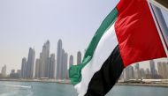 UAE flag flies over a boat at Dubai Marina, Dubai, United Arab Emirates. Reuters/Ahmed Jadallah
