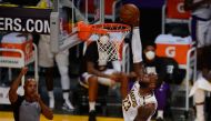 Los Angeles Lakers forward LeBron James (23) dunks for a basket against the Phoenix Suns during the second half in game four of the first round of the 2021 NBA Playoffs. 