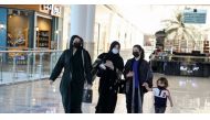 Women wear face masks as they walk at the Hayat mall after restaurants and malls reopened as the government eases the coronavirus lockdown restrictions, in Riyadh, Saudi Arabia June 1, 2020. REUTERS/Ahmed Yosri