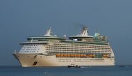 Adventure of the Seas, operated by Royal Caribbean International, arrives at dawn as the first cruise ship carrying tourists to Cozumel since the outbreak of the coronavirus disease (COVID-19) pandemic in March 2020, in Cozumel, Mexico June 16, 2021. (REU