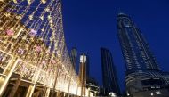 People walk outside The Dubai Mall in Dubai, United Arab Emirates. (Reuters/Satish Kumar/File Photo)