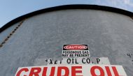 A sticker reads crude oil on the side of a storage tank in the Permian Basin in Mentone, Loving County, Texas, U.S. November 22, 2019. REUTERS/Angus Mordant/File Photo
 