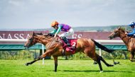 Jockey Kieran Shoemark guides Lady Bowthorpe towards the victory in the Qatar Nassau Stakes on the third day of the Qatar Goodwood Festival yesterday.  