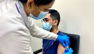 A man receives a dose of a vaccine against the coronavirus disease (COVID-19), in Dubai, United Arab Emirates December 28, 2020. REUTERS/Abdel Hadi Ramahi/File Photo

