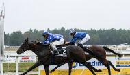 Jockey Alejandro Gutirrez-Val astride H H Sheikh Mohammed bin Khalifa Al Thani's Gavial on their way to win the Prix Du Gabardan at Mont-De-Marsan in France yesterday. Pic: Laurent Ferriere