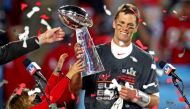 Tampa Bay Buccaneers quarterback Tom Brady (12) celebrates with the Vince Lombardi Trophy after beating the Kansas City Chiefs in Super Bowl LV at Raymond James Stadium. Mandatory Credit: Mark J. Rebilas-USA TODAY Sports