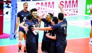 Qatari players celebrate after defeating South Korea.