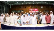 QVA President Ali Ghanem Al Kuwari, QVA General-Secretary Yousef Kano, QVA’s Head of Referee Ibrahim Al Namaa, and QVA Board Member Mohammed Salem Al Kuwari cut a cake to celebrate Qatar’s historic feat of qualifying for the FIVB Men’s World Championship 