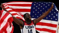 Draymond Green of the United States celebrates after winning the gold medal match against France as he waves the United States flag REUTERS/Sergio Perez

