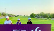 Participating young golfers pose for a photo.