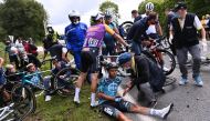 June 26, 2021 B&B Hotels p/b KTM rider Cyril Lemoine of France receives medical attention Pool via REUTERS/Anne-Christine Poujoulat/File Photo