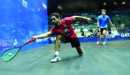 Egypt's Tarek Momen (left) in action against England's Tom Richards during their third round clash, yesterday.