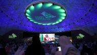 Saudi Arabia's Crown Prince Mohammed bin Salman is seen on the screen during the Saudi Green Initiative Forum organised to discuss efforts by the world's top oil exporter to tackle climate change in Riyadh, Saudi Arabia, October 23, 2021. Reuters/Ahmed Yo