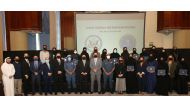 Officials and participants of the security awareness course pose for a photograph.