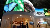 People visiting the Qatar pavilion during the UN Climate Change Conference (COP26) in Glasgow, Scotland, Britain, yesterday.