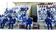 Officials and students during the graduation ceremony.
