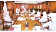 Minister of Labour H E Dr Ali bin Saeed bin Samikh Al Marri chairing the meeting of the National Committee to Combat Human Trafficking, yesterday.
