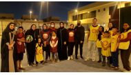 Assistant Foreign Minister and Spokesperson for the Ministry of Foreign Affairs H E Lolwah bint Rashid Al Khater with Afghan evacuees during activities organised by Koora Time initiative.