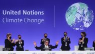 COP26 President Alok Sharma gestures as he receives applause during the UN Climate Change Conference (COP26) in Glasgow, Scotland, Britain November 13, 2021. REUTERS/Yves Herman