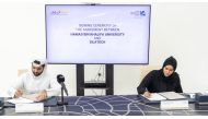 Silatech CEO, Hassan Ali Al Mulla and Dr. Maryam H Al Mannai, Vice-President for Student Affairs at HBKU, signing the agreement.