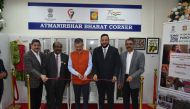 Ambassador of India to Qatar H E Dr. Deepak Mittal (centre) inaugurating the ‘Aatmanirbhar Bharat Corner’ at the embassy. 
