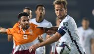 San Marino's Enrico Golinucci in action with England's Harry Kane Reuters/Jennifer Lorenzini