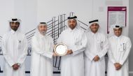 National Coordinator of IPRA in Qatar, Jassem Ibrahim Fakhroo, handing over the golden award to Abdulla Saad Al Saad, Public Relations and Communications Manager at Ashghal.