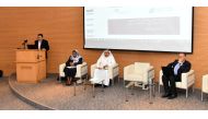 Prof. Noureddine Miladi, (left) Mass Communication Department at QU during a presentation in the presence of (right) Dr. Moez ben Messaoud (right) and others. 