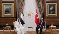 Turkish President Tayyip Erdogan and Abu Dhabi Crown Prince Sheikh Mohammed bin Zayed al-Nahyan, the UAE\'s de facto ruler, meet in Ankara, Turkey, November 24, 2021. Murat Cetinmuhurdar/Presidential Press Office/Handout via Reuters 