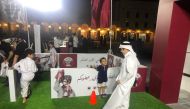 Fans take part in FIFA Arab Cup promotional programmes at the Katara Cultural Village.