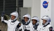 European Space Agency (ESA) astronaut Matthias Maurer of Germany, NASA astronauts Raja Chari, Tom Marshburn, and Kayla Barron wave while departing the crew quarters for launch aboard a SpaceX Falcon 9 rocket on a mission to the International Space Station at the Kennedy Space Center in Cape Canaveral, Florida, U.S., November 10, 2021. REUTERS/Joe Skipper/File Photo