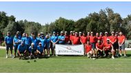 Team Rest of the World (ROW) Blues and Team England players at the Doha Golf Cup.