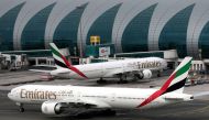 FILE PHOTO: Emirates Airline Boeing 777-300ER planes are seen at Dubai International Airport in Dubai, United Arab Emirates, February 15, 2019. REUTERS/Christopher Pike/File Photo
