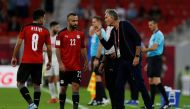 Egypt coach Carlos Queiroz gives instructions to Mohamed Magdi.