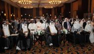 Minister of Labour H E Dr. Ali bin Smaikh Al Marri, Secretary-General of the Ministry of Foreign Affairs H E Dr. Ahmed bin Hassan Al Hammadi and Chief of IOM Mission in Qatar, Iman Erieqat and other dignitaries  during the event  yesterday. Pic: Salim Matramkot/THE PENINSULA