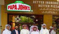 Officials and guests at the opening of a Papa John's outlet in The Pearl-Qatar. 