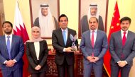 Ambassador of Qatar to China, Mohammed bin Abdullah Al Duhaimi, with embassy officials in Beiing.