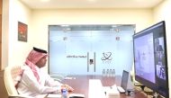 QNA Director-General Ahmed Said Jaber Al Rumaihi during a virtual meeting with Acting Director-General of UNA Mohammed Abd Rabbo Al Yami. 
