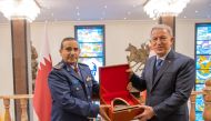 Chief of Staff of Armed Forces H E Lieutenant-General (Pilot) Salem bin Hamad Al Nabit with Minister of National Defence of Turkey H E Hulusi Akar.
